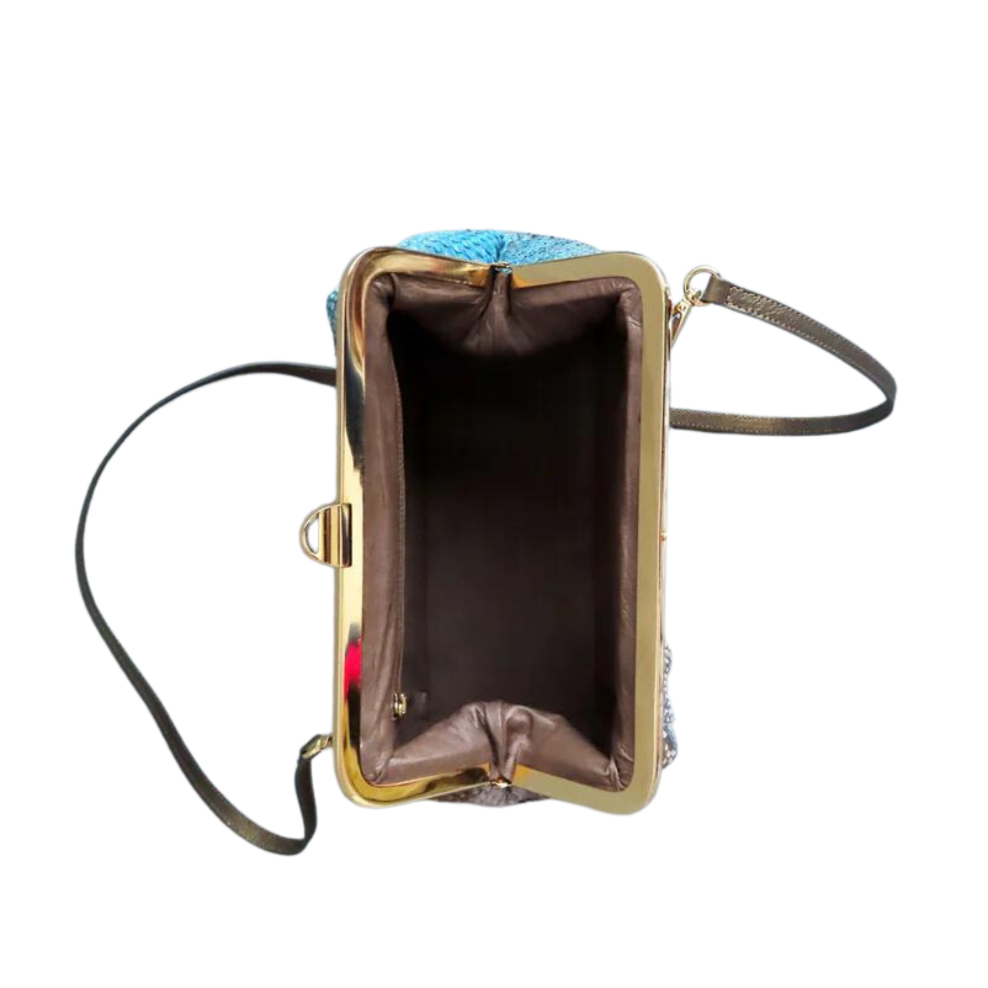 Vista alzada del interior del bolso COFRE, forrado en piel con compartimentos organizadores y bolsillo cremallera.