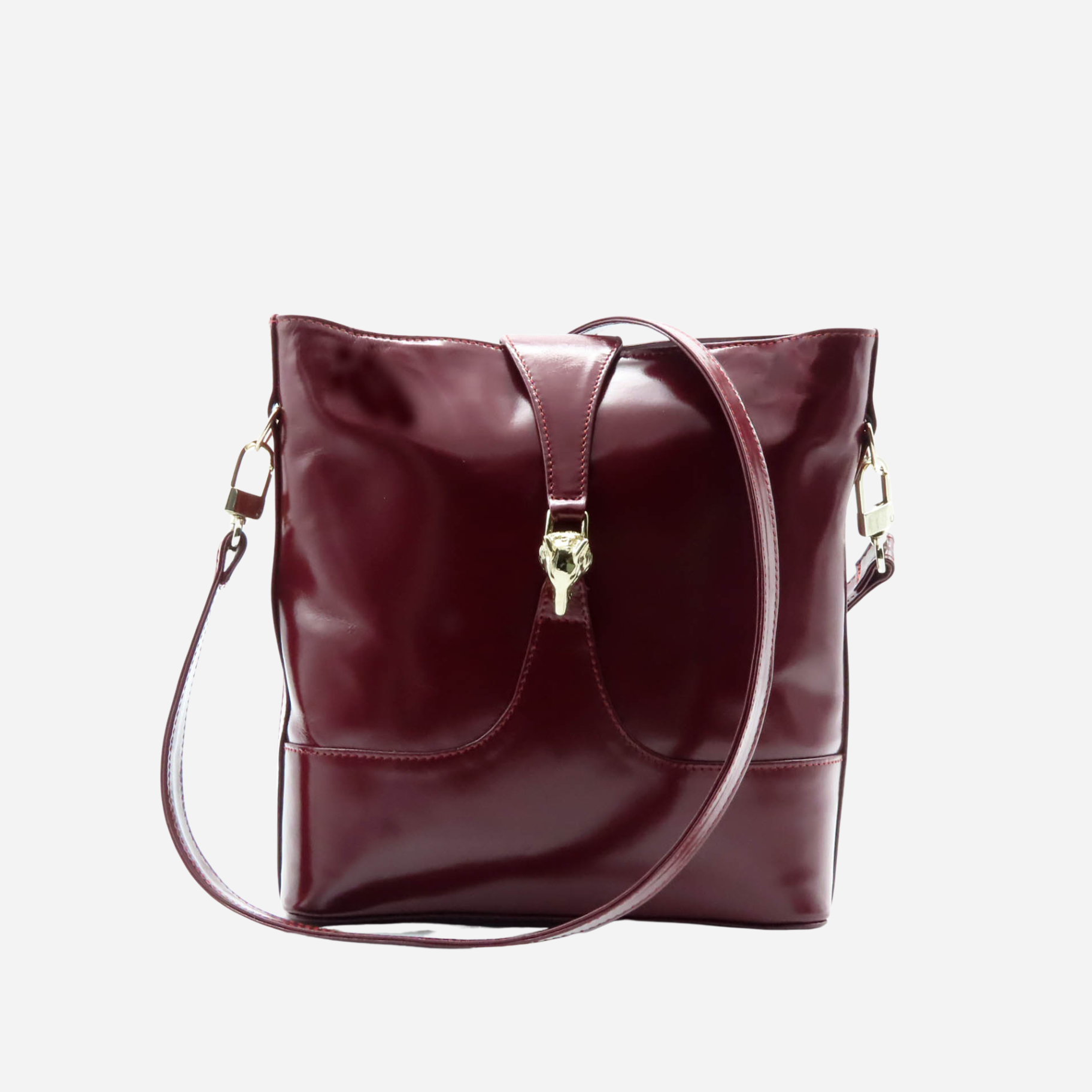 Bolso IDENTITY en piel de becerro color burdeos - vista frontal con broche Lobo