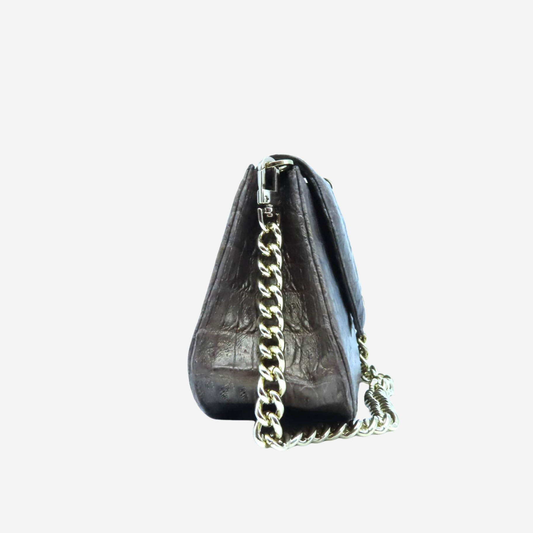 Vista de perfil del bolso Toti Baguette en piel de cocodrilo